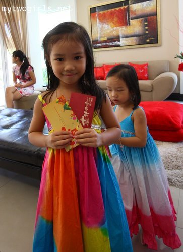 Zara with her first few ang pows